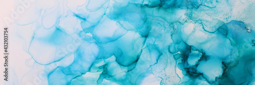 art photography of abstract fluid painting with alcohol ink, blue and green colors