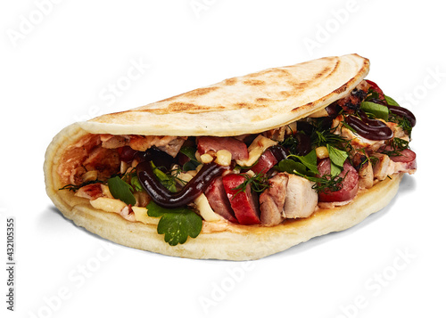 closed pizza with big toppings isolate on white background