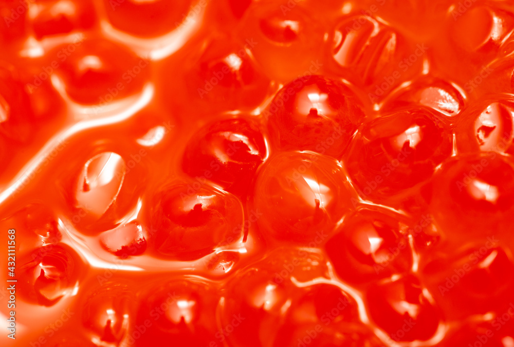 Close-up of red caviar as background. Close-up of red caviar as background.