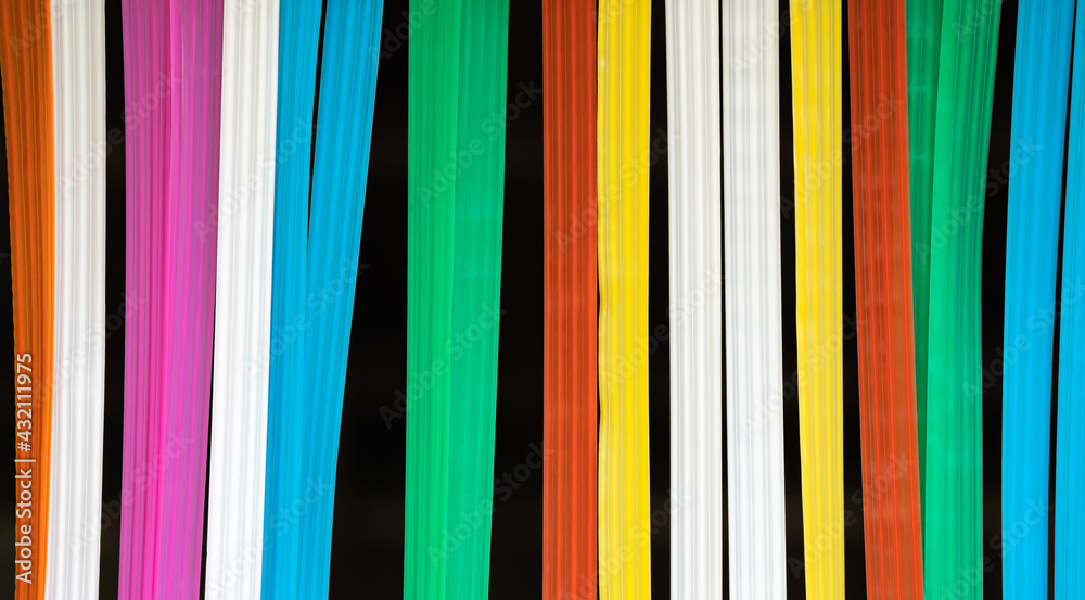 Abstract background from strips of the multicolored curtains Abstract background from strips of the multicolored curtains