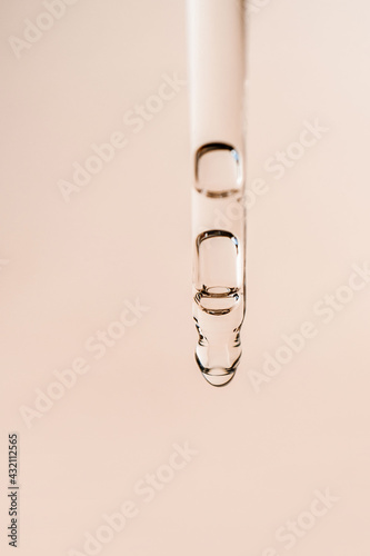 Cosmetic product in a pipette with bubbles.