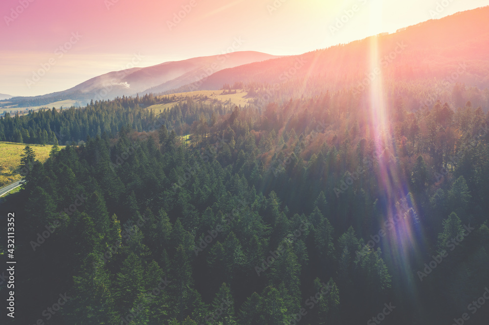 Sunrise in the mountains. Mountain landscape in the morning. Aerial view Sunrise in the mountains. Mountain landscape in the morning. Aerial view