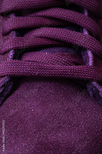 Closeup of wine color sneakers