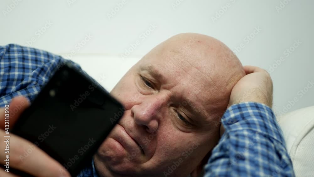 Businessman Use a Mobile Phone, Send Messages and Gesticulate Nervously and Disappointed Businessman Use a Mobile Phone, Send Messages and Gesticulate Nervously and Disappointed