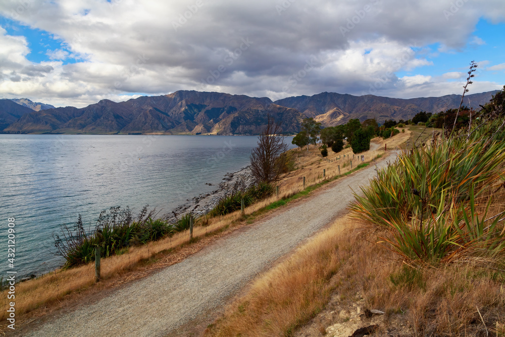 Lake Hawea in the South Island of New Zealand., lying in a valley ...