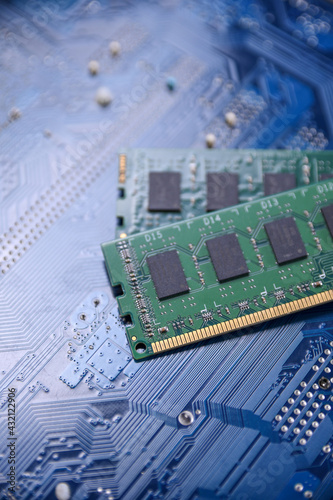 Computer memory RAM on motherboard background . Close up. system, main memory, random access memory, onboard, computer detail. Computer components . DDR3. DDR4. DDR5