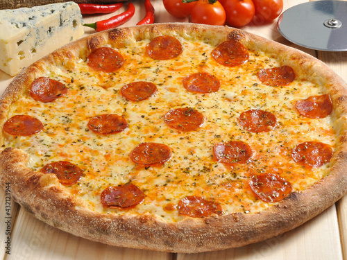 spicy pizza with chorizo and cheese with mold photo