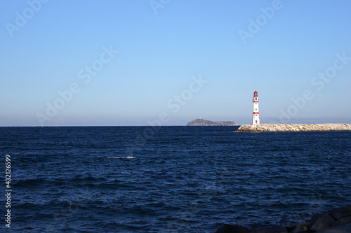 Panoramic view of a lighthouse at the coast of Turgutreis, Bodrum, Turkey. 