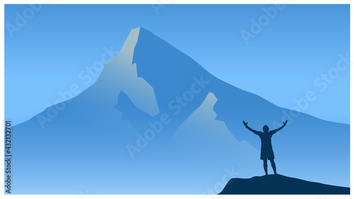 silhouette of a person in the mountains