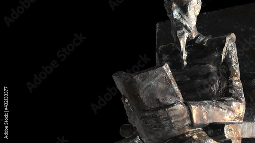Don Quixote of La Mancha reads a book-Dx from below - Metal - 3d model animation on a black background photo