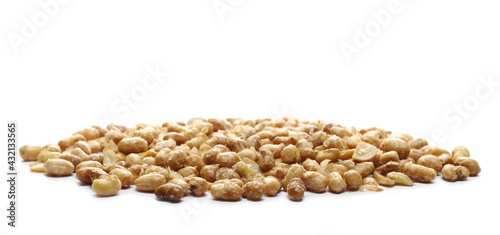 Organic roasted soybeans pile, isolated on white background