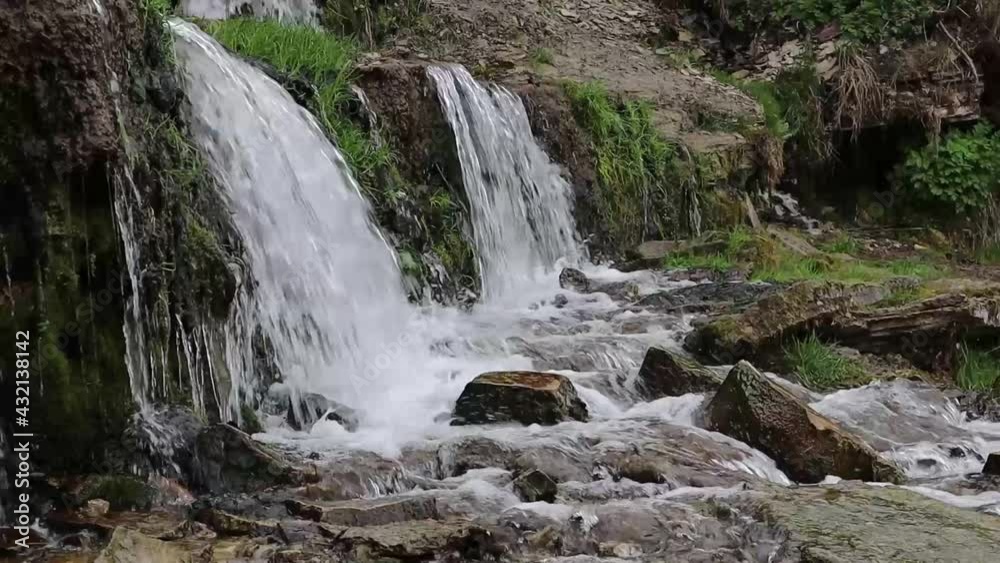 Millennial cold and fresh healthy springs going out from underground grottoes Millennial cold and fresh healthy springs going out from underground grottoes