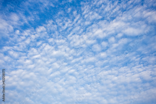 blue sky with clouds and texture