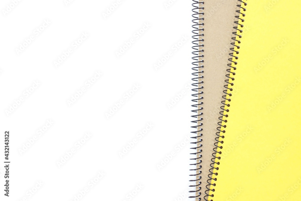 Yellow notebook with loop isolated on a white background