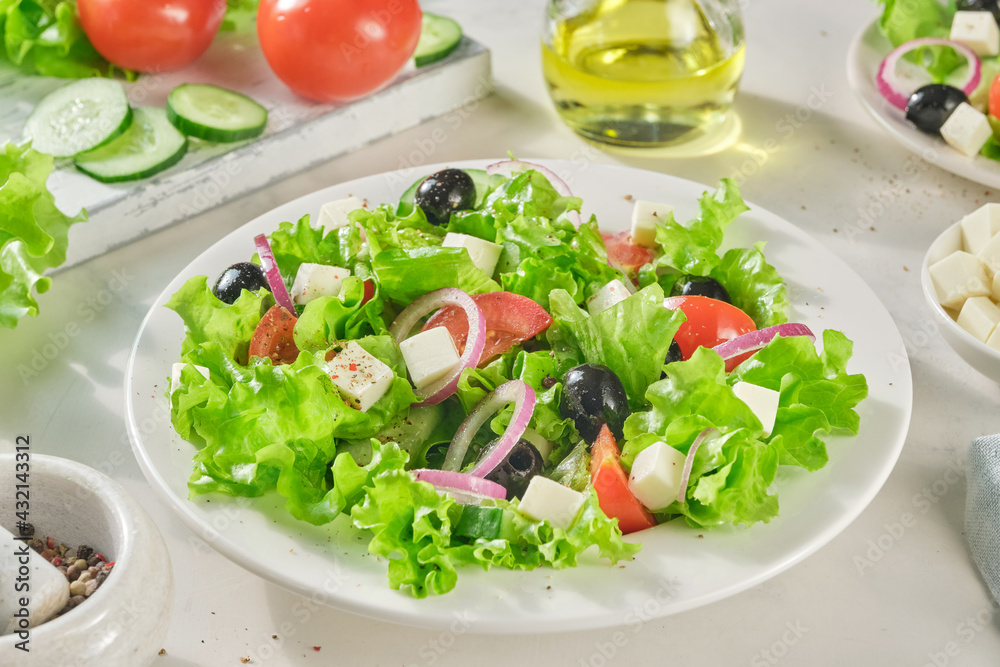 Traditional greek salad with fresh vegetables, feta cheese and olives