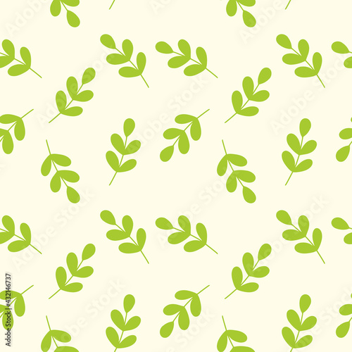 Seamless yellow pattern with green branch.