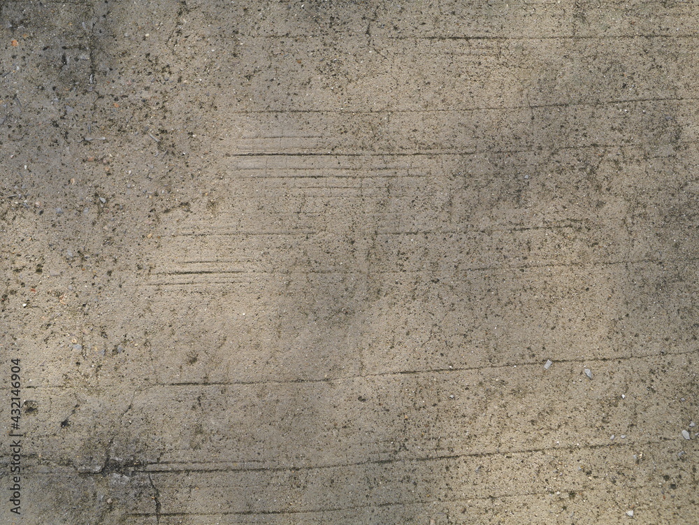 Obraz premium The background image of the cement road hitting the sunlight.