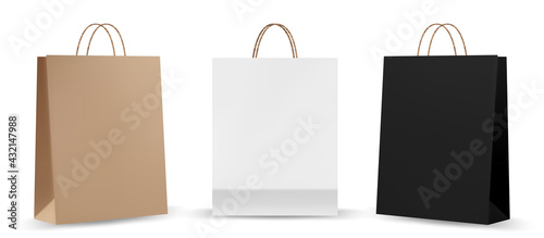 Shopping bag mockups. Paper package isolated on white background. Realistic mockup of craft paper bags. photo