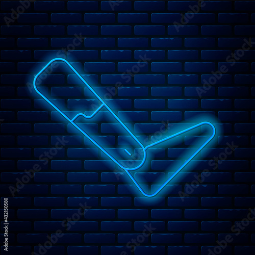 Glowing neon line Prosthesis leg icon isolated on brick wall background. Futuristic concept of bionic leg, robotic mechanical leg. Vector