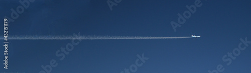 Stunning Large - Format Banner of KLM Airplane in Clear Blue Sky – Horizontal Flight Path & Air Pollution Theme