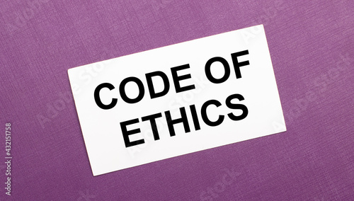 On a lilac background, a white card with the words CODE OF ETHICS