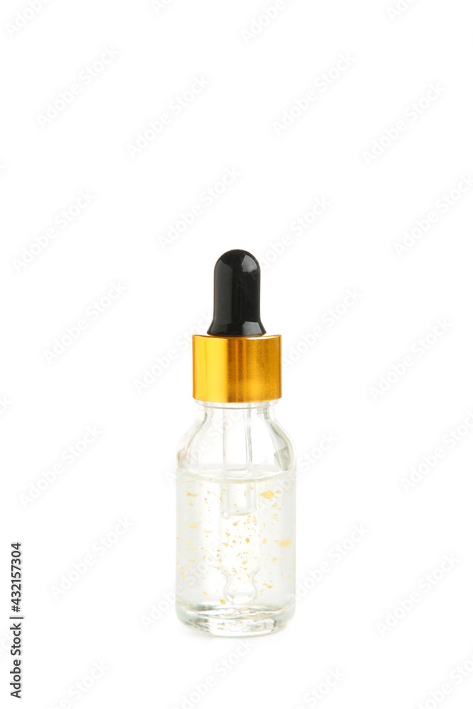 A glass bottle with a pipette with oil, serum isolated on white background with copy space. Flatlay