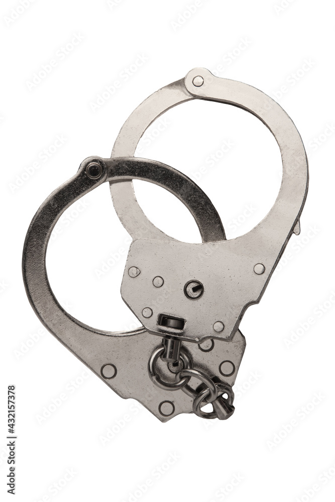 Interlocked handcuffs isolated on a white background. Top view Interlocked handcuffs isolated on a white background. Top view