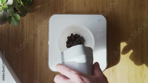 Making speciality coffee at home. Barista weighs a portion of coffee beans. Aromatic filter coffee on the table. Coffee break. Breakfast. top view.