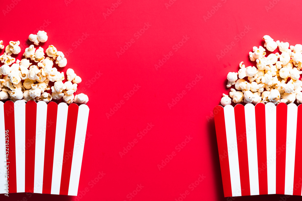 Popcorn Buckets on Red Background. Copy Space Template