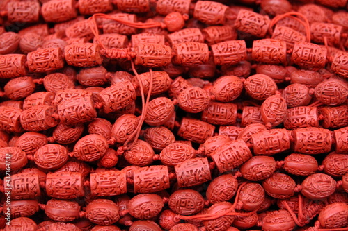 Red Chinese Cinnabar Lacquer Bracelets and Necklaces in Chinatown store. photo