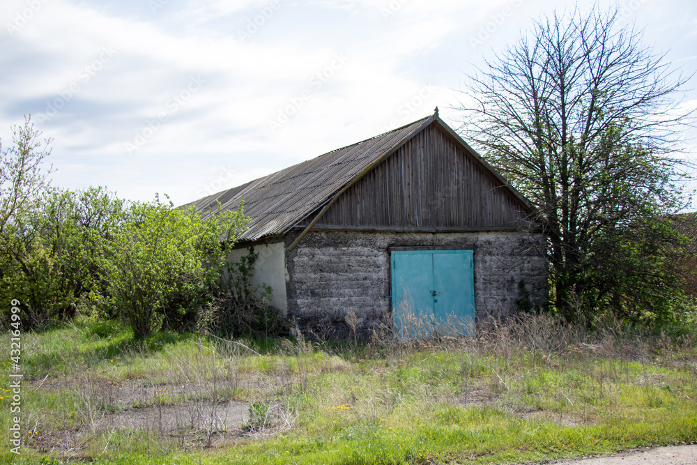 New buildings and old buildings grain storage hangars in the countryside of Ukraine New buildings and old buildings grain storage hangars in the countryside of Ukraine