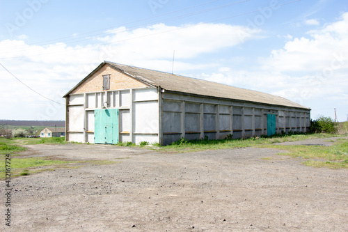 New buildings and old buildings grain storage hangars in the countryside of Ukraine