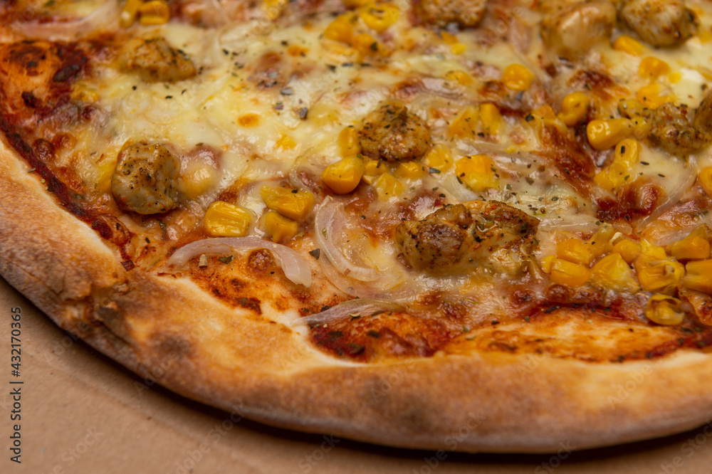 closeup of Hawaiian pizza with pineapple