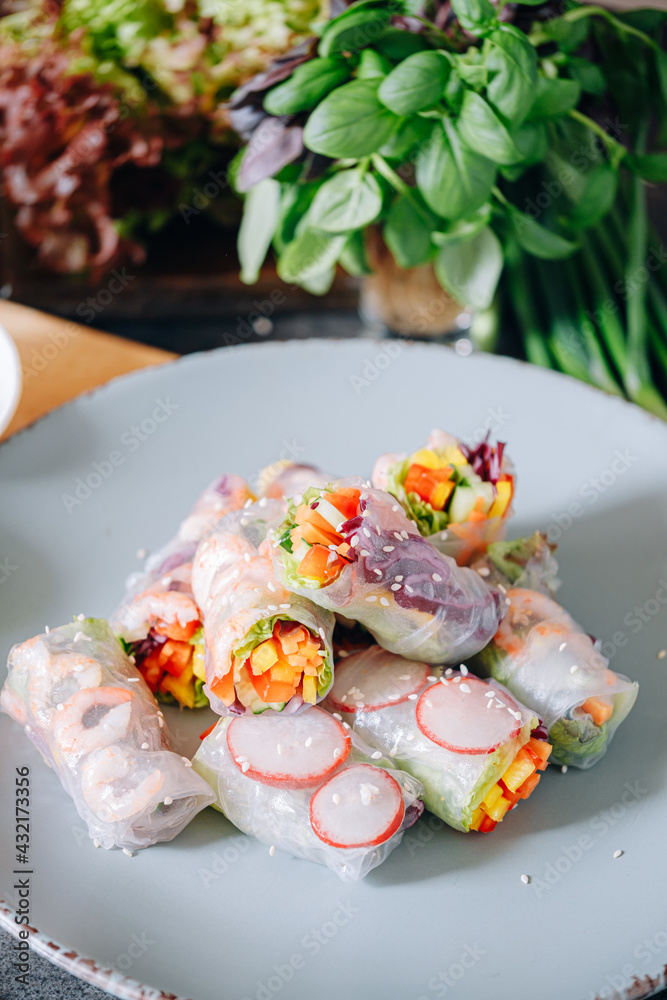 fresh springrolls with vegetables and shrimps. a healthy dish of rice paper and fresh organic vegetables fresh springrolls with vegetables and shrimps. a healthy dish of rice paper and fresh organic vegetables