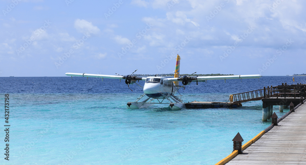 seaplane at the pier in a tropical island resort