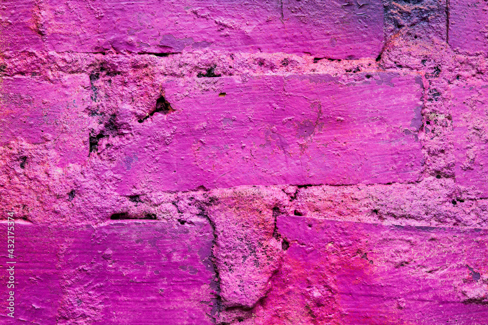 Purple and old brick wall. Close up view Purple and old brick wall. Close up view