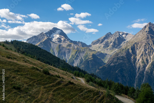 View on ski station Les deux Alpes and Alpine mountains peaks in summer, Isere, France