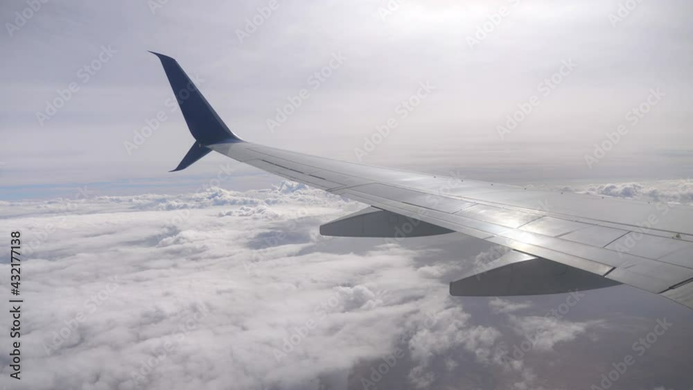 Airplane flight above the clouds in 4K Airplane flight above the clouds in 4K
