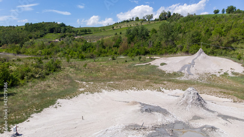 salty volcanoes of nirano geological formations natural park photo