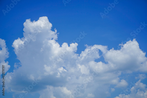 blue sky background with clouds. Beautiful white clouds against the blue sky.