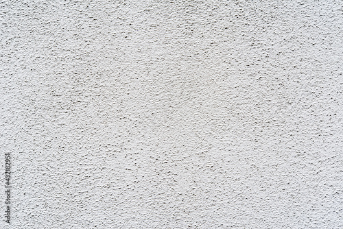 Rough white wall. Close up view