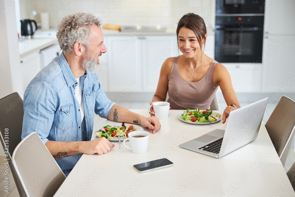 Positive delighted woman listening to funny stories Stock Photo | Adobe Stock Positive delighted woman listening to funny stories Stock Photo | Adobe Stock