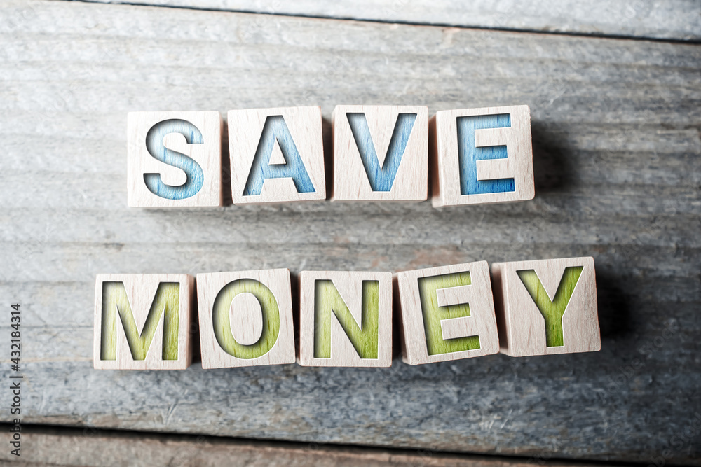 Save Money Written On Wooden Blocks On A Board Save Money Written On Wooden Blocks On A Board