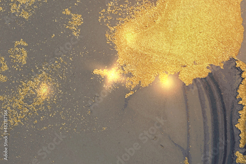Grey, blue and gold pattern with texture of marble and sparkles. Abstract vector background in alcohol ink technique. Modern paint with glitter. Template for banner, poster design. Fluid art painting