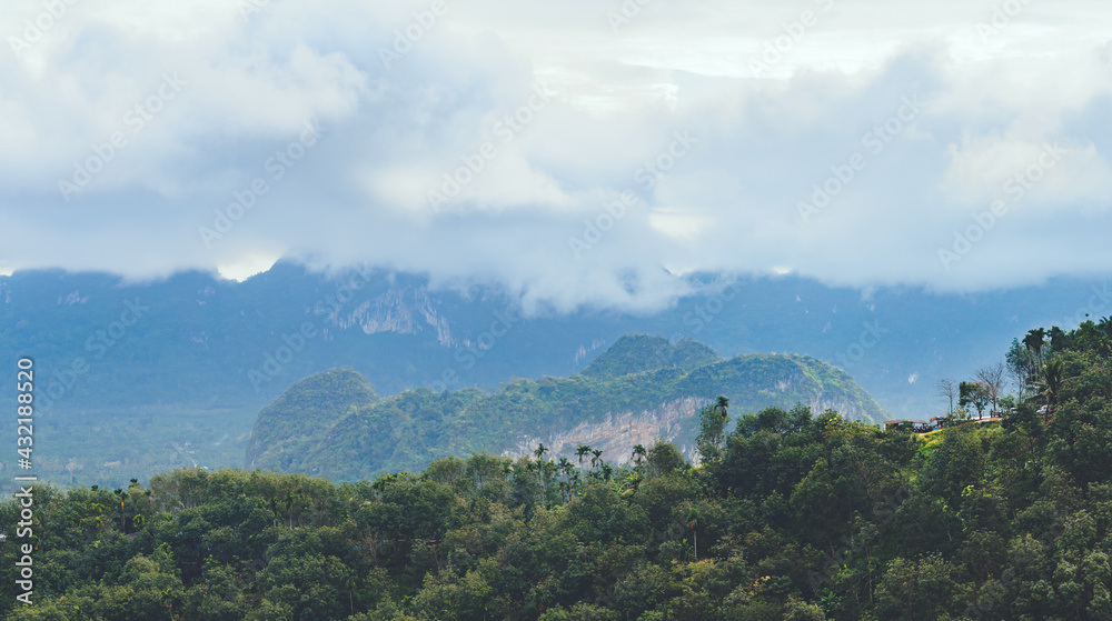 Beautiful panoramic hills and mountains scenery with morning atmosphere during rainy season at Doi Tapang, Sawi District, Chumphon, Thailand.