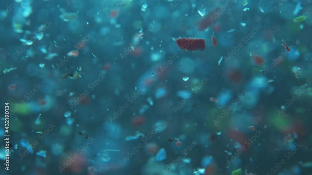 Global ocean pollution - microplastic in water. recycling concept plastic background. plastic fragments or particles in ocean. sing;e use plastics