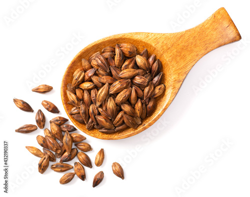 Barley Tea in the wooden spoon, isolated on white background, top view