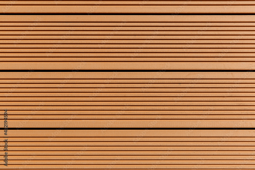 Artificial modern board for the terrace, close-up, texture. Artificial modern board for the terrace, close-up, texture.