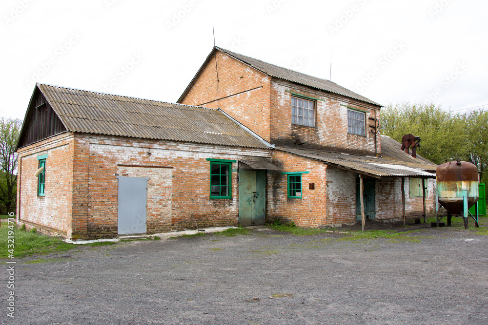 In rural areas, a universal building made of bricks oil mill grain slaughterhouse slaughterhouse Ukraine