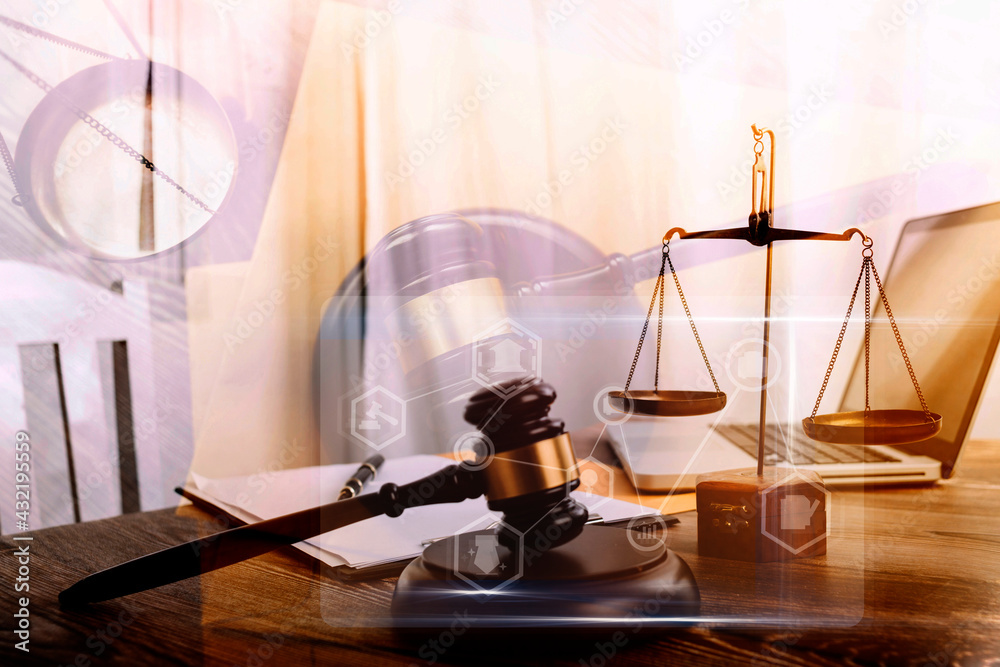 Business and lawyers discussing contract papers with brass scale on desk in office. Law, legal services, advice, justice and law concept picture with film grain effect Business and lawyers discussing contract papers with brass scale on desk in office. Law, legal services, advice, justice and law concept picture with film grain effect
